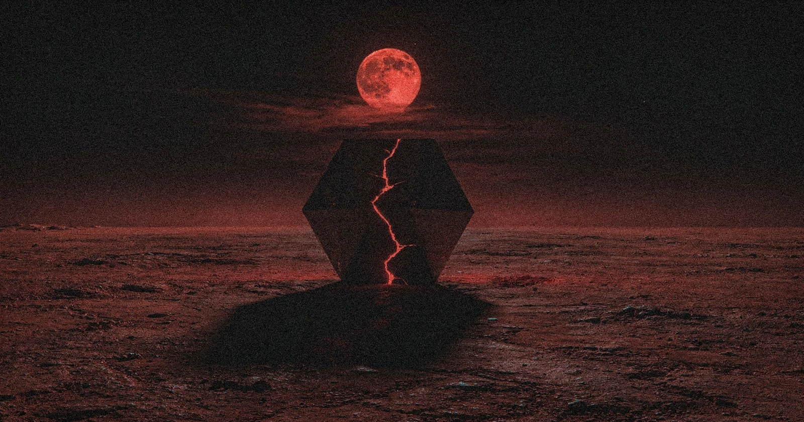 A dark hexagonal monolith split by a glowing red crack stands on a red plain under a blood-red moon